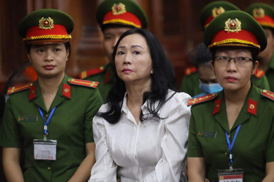 Vietnamese property tycoon Truong My Lan (center) looks on at a court in Ho Chi Minh city. A top Vietnamese property tycoon could face the death penalty when she and dozens of other co-accused face verdicts on April 11 in one of the country's biggest fraud cases over the embezzlement of USD 12.5 billion. - AFP pics