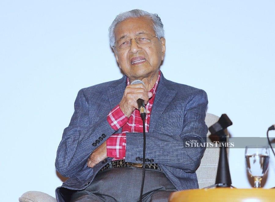 Tun Dr Mahathir Mohamad has questioned former DAP leader Dr P. Ramasamy’s act of calling him a racist when the latter had left DAP to form an Indian political party. - NSTP file pic