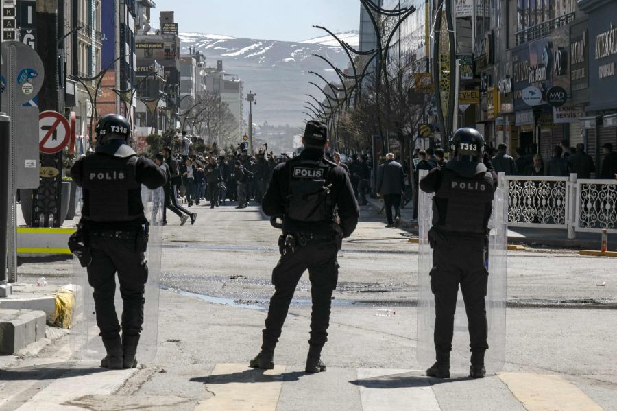 Turkish anti riot police officers block a street as supporters of Turkey's pro-Kurdish party DEM demonstrate to contest a ruling that annulled the election of its mayoral candidate in the eastern city of Van on April 3, 2024. Turkey's pro-Kurdish party said on April 3, 2024 it was contesting a ruling that annulled the election of its mayoral candidate in the eastern city of Van, after the election board's decision sparked clashes. Violent protests against his ouster lasted through the night in Van province, which lies on Turkey's eastern border with Iran. - AFP pic