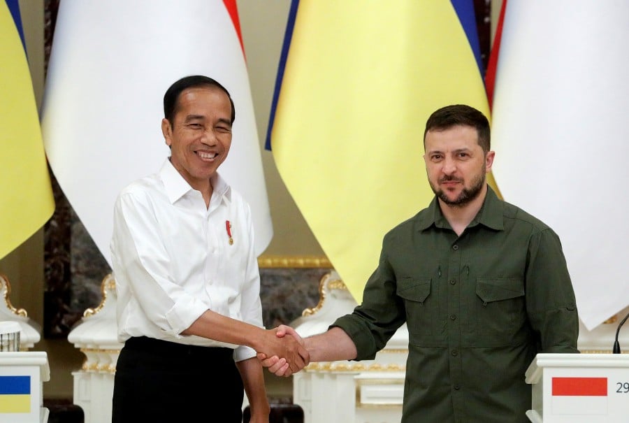 Indonesian President Joko Widodo (L) and Ukrainian President Volodymyr Zelensky (R) shake hands after their briefing at Mariinsky palace in Kyiv (Kiev), Ukraine, 29 June 2022. Widodo is on a peace-building mission visit to Ukraine and Russia to urge his Russian and Ukrainian counterparts to open for dialogue and ceasefire. - EPA pic