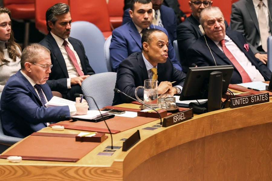 US Political Minister Counselor, John Kelley (C), flanked by Israel's Ambassador to the UN Gilad Erdan (L), speaks during a UN Security Council emergency meeting on the risk of famine and attacks on humanitarian workers in Gaza, at UN headquarters in New York on April 5, 2024. AFP PIC