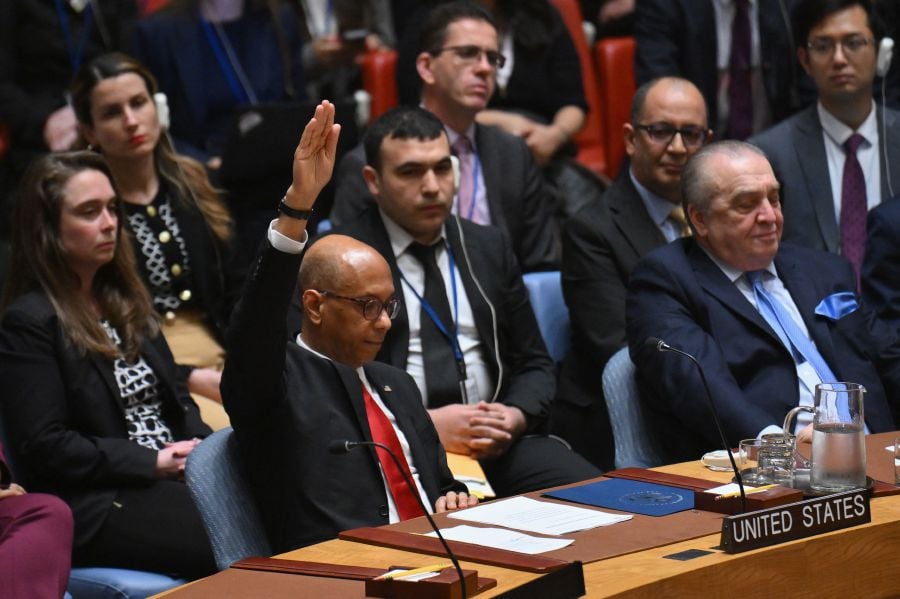 US Deputy Ambassador to the UN Robert Wood votes against a resolution allowing Palestinian UN membership at United Nations headquarters in New York, on April 18, 2024, during a United Nations Security Council meeting on the situation in the Middle East, including the Palestinian question. The United States vetoed a Security Council measure on a Palestinian bid for full United Nations membership. The draft resolution, which was introduced by Algeria and "recommends to the General Assembly that the State of Palestine be admitted to membership of the United Nations," received 12 votes in favor, two abstentions and one against.- AFP pic