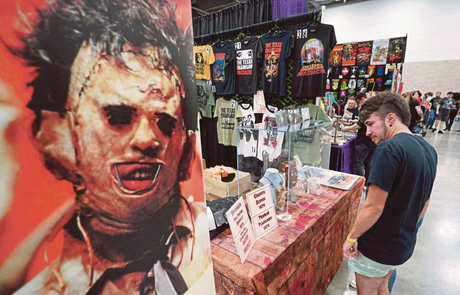 Fans of the "Texas Chainsaw Massacre" movie gather during the Texas Frightmare Weekend in Irving, Texas on May 18, 2024. - AFP / FRANCOIS PICARD