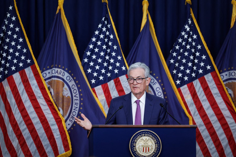 The US Federal Reserve is highly likely to keep interest rates unchanged later this week, as policymakers contend with a recent uptick in inflation that has sharply cut the chance of a summer start to interest rate cuts.  (Anna Moneymaker/Getty Images/AFP)
