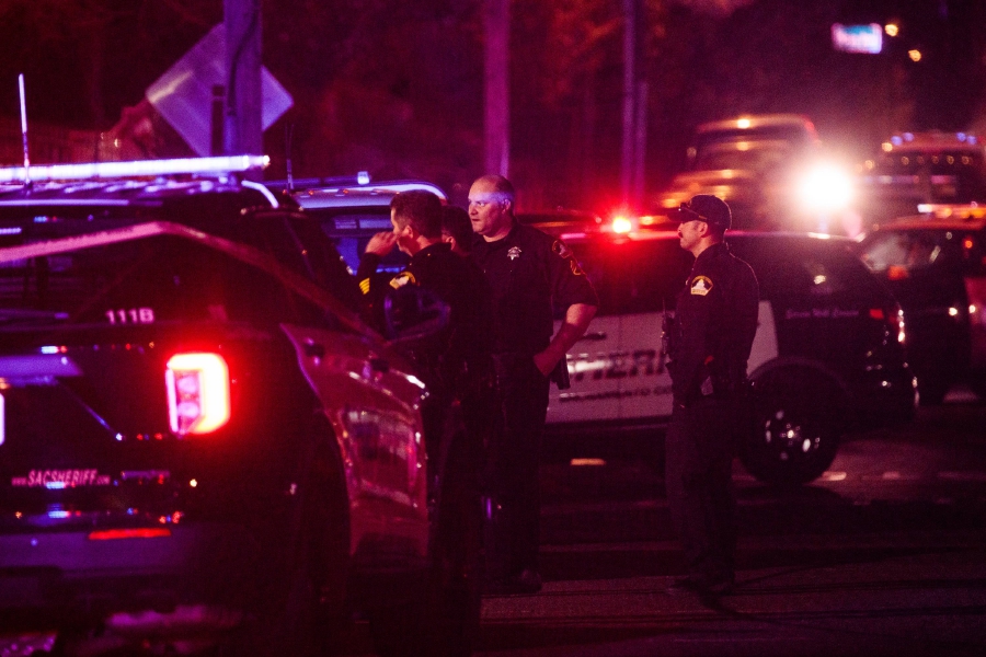 Police officers investigate the scene of a shooting at The Church in Sacramento on February 28, 2022, in Sacramento, California. Police have said a father killed himself after shooting and killing his family, including three children, at the church. (Photo by Max Whittaker/Getty Images/AFP) Max Whittaker