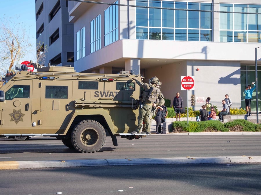 A SWAT vehicle arrives at the UNLV campus after a shooting in Las Vegas, Nevada. (Photo by Mingson Lau / GETTY IMAGES NORTH AMERICA / Getty Images via AFP)