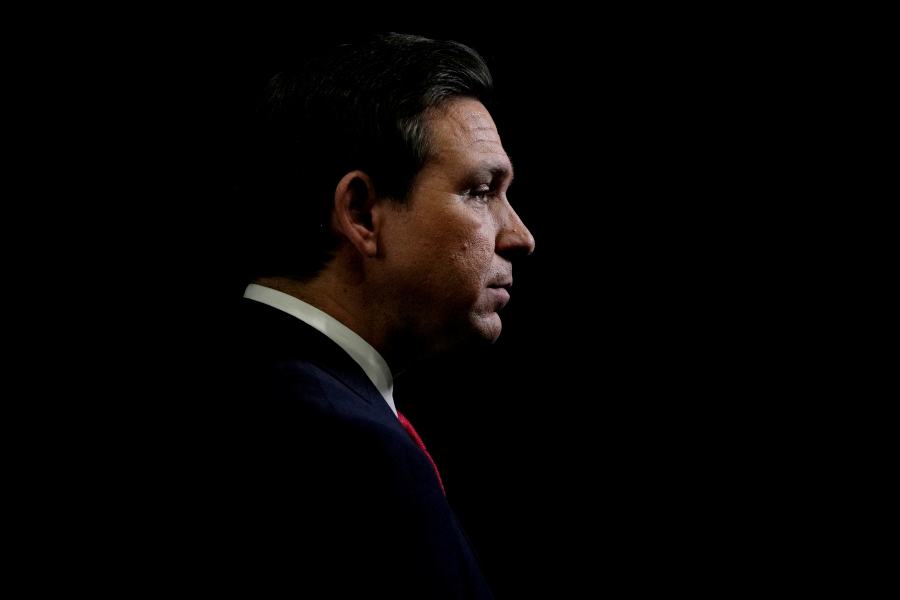 (FILE PHOTO) Florida Governor Ron DeSantis is interviewed in the "Spin Room" following the conclusion of the Republican candidates' presidential debate hosted by CNN at Drake University in Des Moines, Iowa. (REUTERS/Cheney Orr/File Photo)