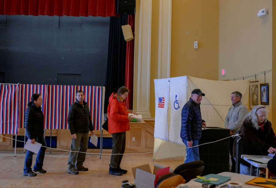 Voters stand in line during New Hampshire's first-in-the-nation U.S. presidential primary election at the Medallion Opera House in Gorham, New Hampshire, U.S. (REUTERS/Faith Ninivaggi)