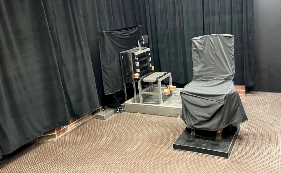 South Carolina's renovated Capital Punishment Facility, with the firing squad chair at left behind the covered electric chair, is seen from the witness room at Broad River Correctional Institution in Columbia, South Carolina, U.S. in an undated photograph. (Photo by South Carolina Department of Corrections/Handout via REUTERS.)