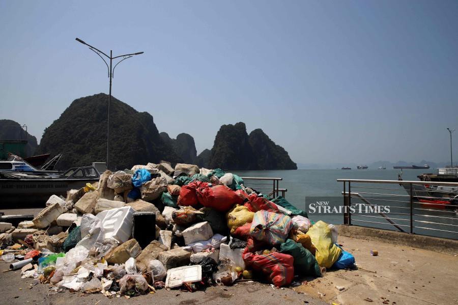  A pile of trash collected from Ha Long Bay in northeast Vietnam. More than seven million visitors came to visit the spectacular limestone karsts of Ha Long Bay, on Vietnam's northeastern coast, in 2022. Authorities hope that number will jump to eight and a half million this year. But the site's popularity, and the subsequent rapid growth of Ha Long City -- which is now home to a cable car, amusement park, luxury hotels and thousands of new homes -- severely damaged the ecosystem of the water.- AFP pic