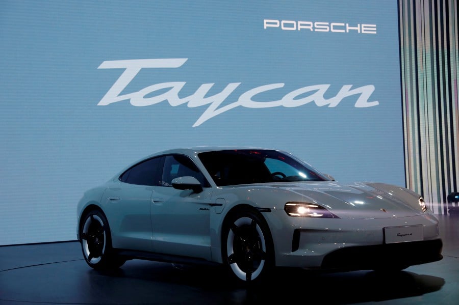  A Porsche Taycan Electric Vehicle (EV) is showcased at a Volkswagen media event in Beijing, China on Wednesday (April 24). — REUTERS