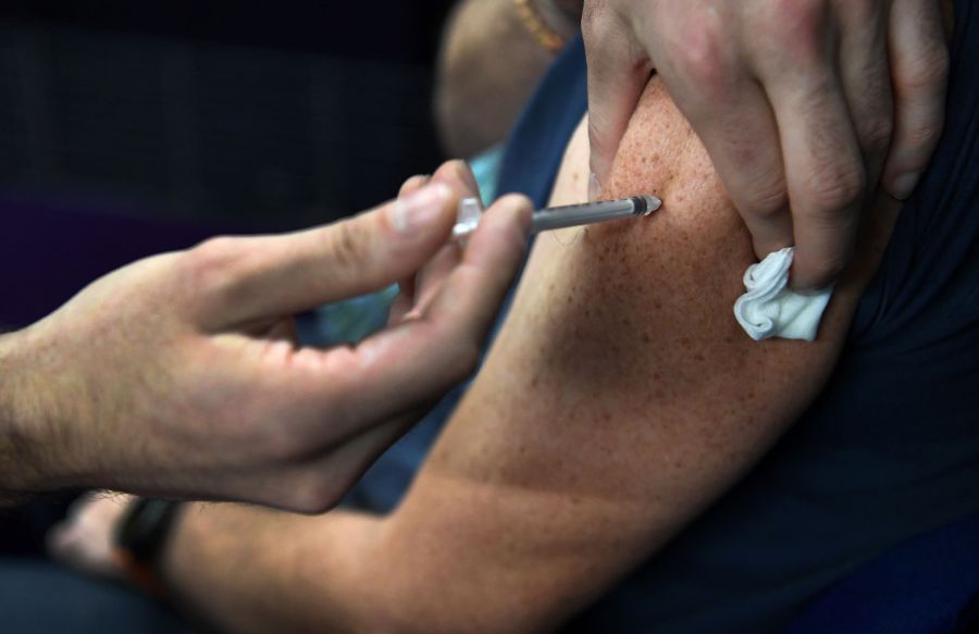 After two years of racing to vaccinate the world against Covid-19, the number of available doses now surpasses demand in many areas. - AFP pic