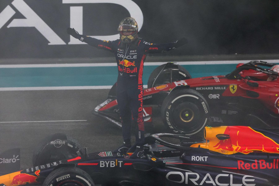 Red Bull Racing's Dutch driver Max Verstappen celebrates winning the Abu Dhabi Formula One Grand Prix at the Yas Marina Circuit in the Emirati city. - AFP PIC