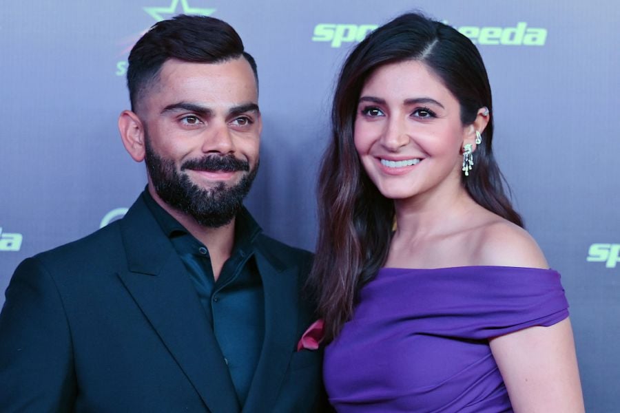 (FILES) Indian cricketer Virat Kohli (L) and his wife Anushka Sharma pose during the 'Indian Sports Honours' in Mumbai on March 23, 2023. Indian cricket superstar Virat Kohli, who opted out of the Test series against England, has announced the birth of his second child, ending speculation over his absence. - AFP pic