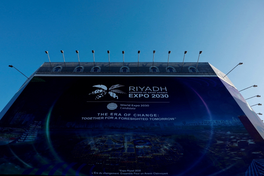 (FILE PHOTO) A huge billboard advertising Riyadh, Saudi Arabia as candidate of the World Expo 2030 is seen in Paris as the host country of The World Expo 2030 will be elected by BIE Member States that will gather in the 173rd General Assembly in Paris, France. (REUTERS/Gonzalo Fuentes/File Photo)