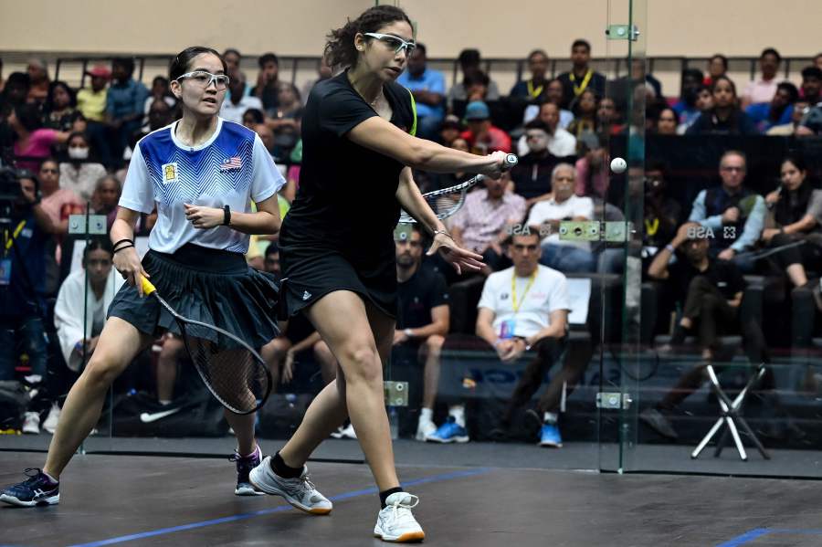 Aira Azman (left) plays against Egypt's Fayrouz Abouelkheir during the Finals match of SDAT WSF Squash World Cup held in Chennai on June 17, 2023. - AFP pic