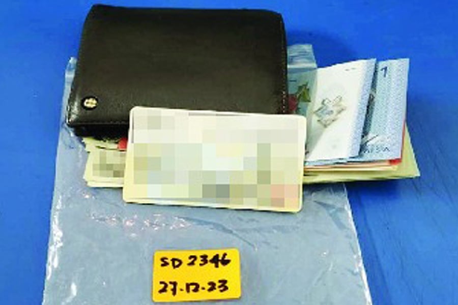 Lee’s wallet in the Lost and Found Department of klia2 on Dec 27. - Pic courtesy of writer