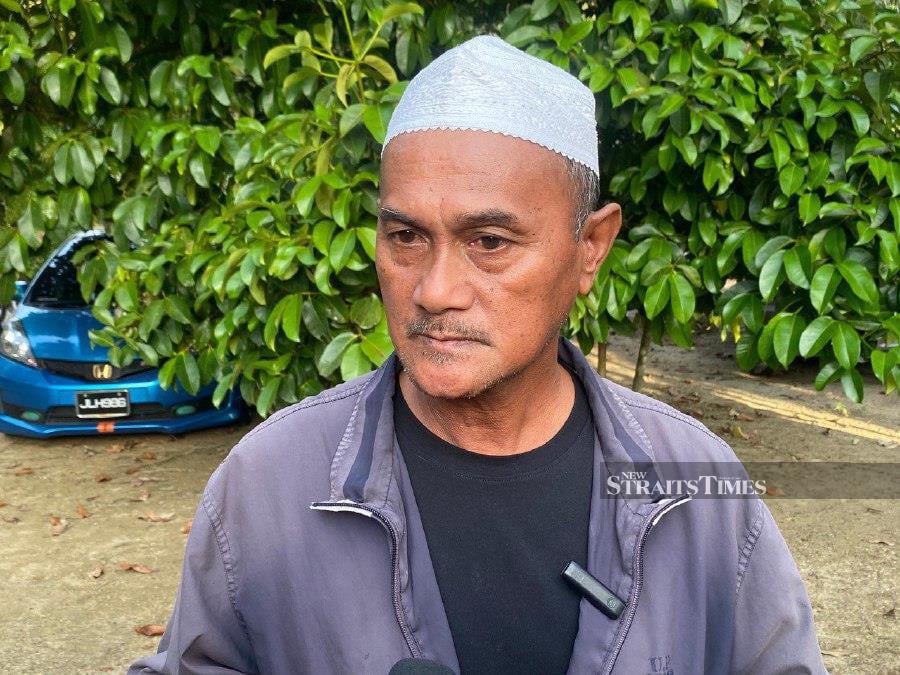 "Finally, the uneasy feeling was answered when we were informed that our son was no more. It's indeed sad, but we accept it because we know everyone will eventually go there (death), and his time has come," Wan Hussin Wan Ishak, 61, said when met at his home in Kampung Alor Selising here, today. - NSTP/ZATUL IFFAH ZOLKIPLY