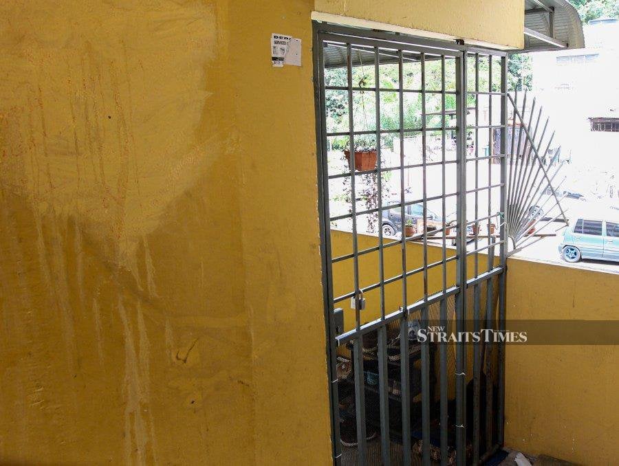Despite receiving a directive from the Kuala Lumpur City Hall (DBKL), residents of Wangsa Maju Section 2 Flat persist in keeping their security grilles in place. - NSTP/ AZIAH AZMEE