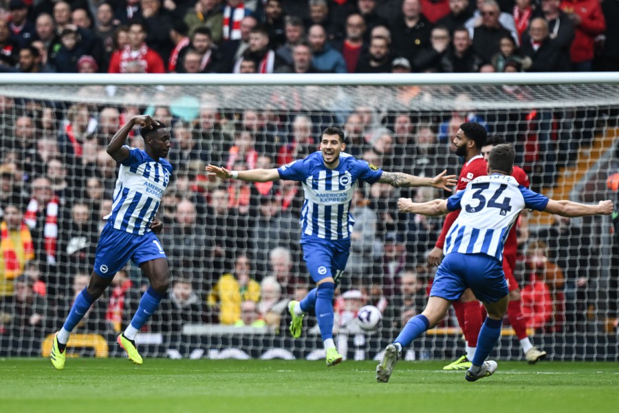  Brighton's English striker Danny Welbeck (Left) celebrates after scoring his team’s only goal during their Premier League clash against Liverpool at Anfield in Liverpool, north west England yesterday (March 31). — AFP