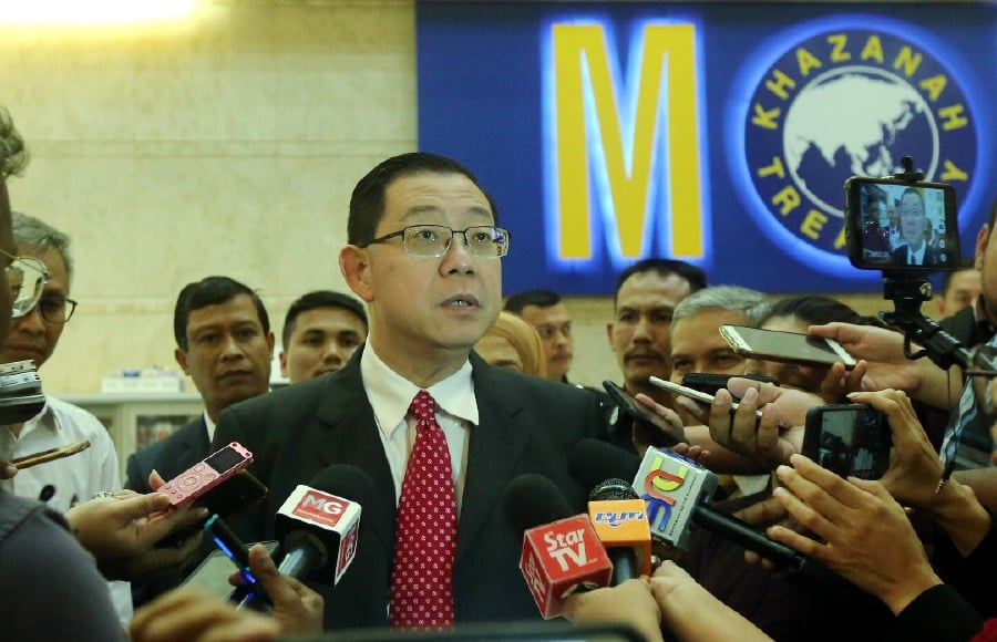 Finance Minister Lim Guan Eng speaking to reporters after meeting the management of 1MDB today. - NSTP/Mohd Fadli Hamzah
