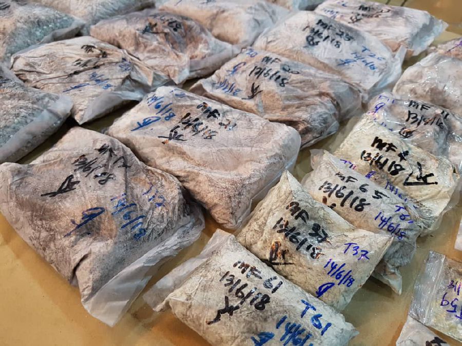 Some of the drugs seized during two separate raids held in Jelutong, Penang recently. Pix by Mikail Ong