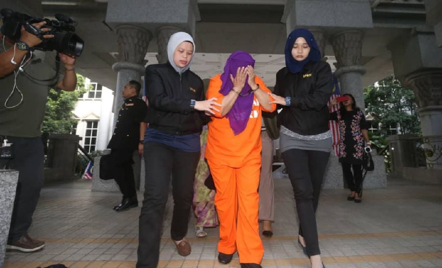 Top Spy Chief Hasanah Arrives In Court To Be Remanded