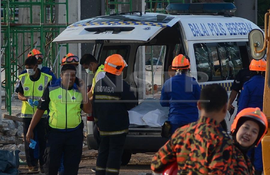 Two workers, believed to be foreigners, were killed while two others seriously injured when pillars of a building under construction at the Prai Industrial Area, here, collapsed this afternoon. Pic by NSTP/SHAHNAZ FAZLIE SHAHRIZAL and courtesy of JBPM