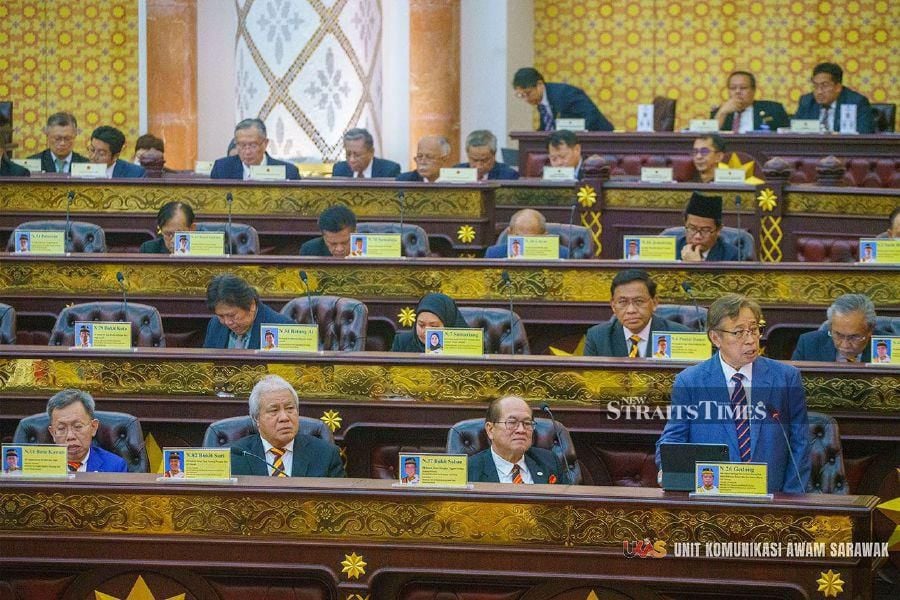 Sarawak Premier Tan Sri Abang Johari Abang Openg (right) delivering his winding-up speech at the Sarawak legislative assembly sitting last month.