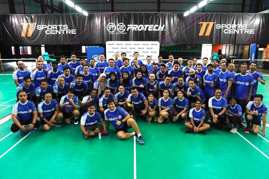 Media and Allianz Malaysia players pose for a group pix of Allianz Media Badminton Tournament 2024. - Pic courtesy by Allianz
