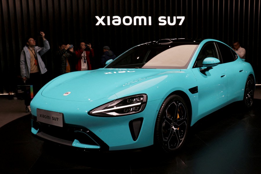 Deliveries for the standard SU7 model, priced at 215,900 yuan ($29,870), may take 18-21 weeks, according to checks by Reuters on Xiaomi’s car app. -- Reuters photo