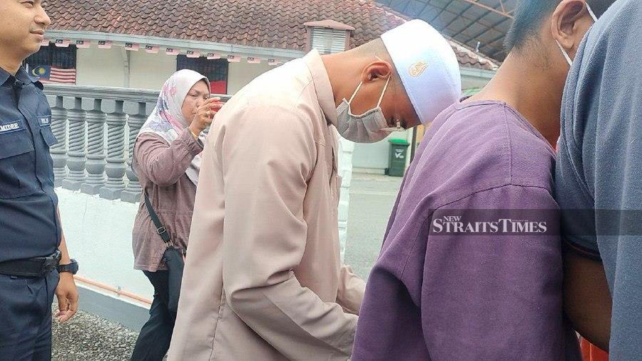 A religious school teacher was charged at the Baling Sessions Court with causing physical and emotional injuries on his eight-year-old student. -NSTP/NOORAZURA ABDUL RAHMAN