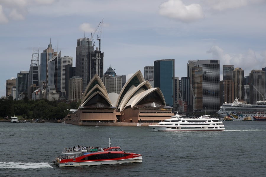 The Sydney Opera House and city centre skyline are seen in Sydney, Australia. REUTERS/Loren Elliott/File Photo