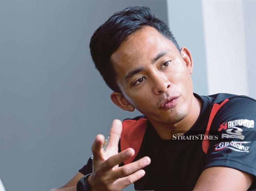 Zulfahmi Khairuddin hopes to seal the deal and secure up-and-coming rider Syarifuddin Azman a seat in next year’s Moto3 World Championships by October. - NSTP file pic