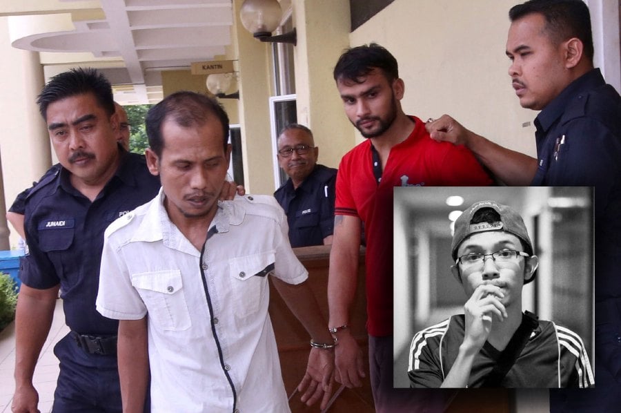 Picture taken on 16 July 2018, shows police officers brought Sua Lay, 33 and Gurpreet Singh, 23, who were accused of murdering grab driver Aiman ​​​​Nosri, 27, who was found dead in a Produa Myvi car at the Selayang Magistrate's Court.- NSTP/HAZREEN MOHAMAD