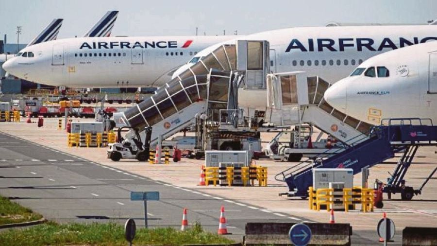 Air France-KLM’s CEO has urged Aeroports de Paris to improve the French capital’s Charles de Gaulle airport, saying a shortage of jetways has created a daily struggle for aircraft parking spaces and higher operating costs. AFP pic