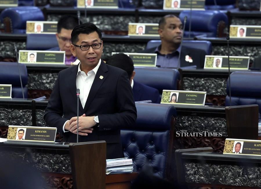 Deputy Home Minister Datuk Mohamad Alamin speaking during the Dewan Rakyat sitting today. - BERNAMA PIC