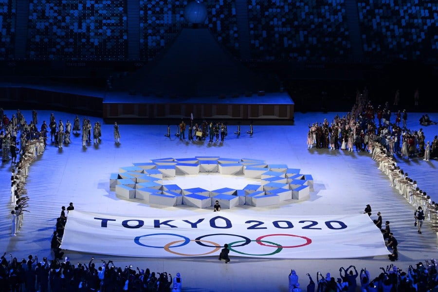 The Tokyo 2020 emblem is seen during the opening ceremony of the Tokyo 2020 Olympic Games, at the Olympic Stadium, in Tokyo. - AFP Pic