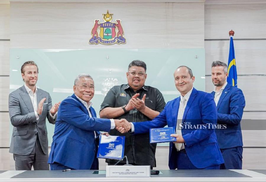 The Melaka International Cruise Terminal (MICT), to be completed by 2026, is expected to draw an additional 15.8 million visitors per year, including 10 million foreign tourists, said Melaka Chief Minister Datuk Seri Ab Rauf Yusoh (center). NSTP/AMIR MAMAT