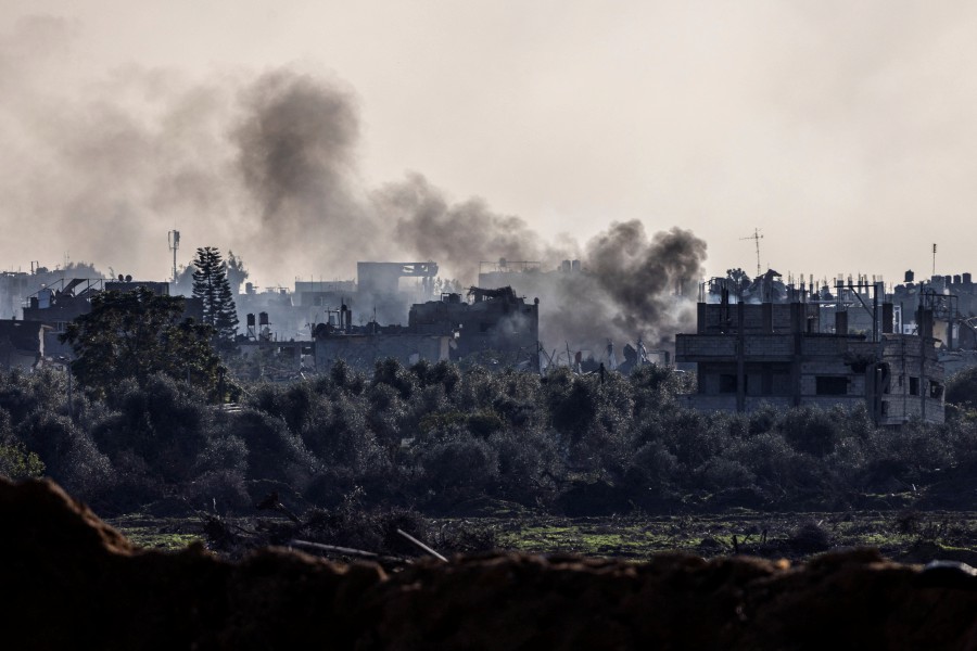 Smoke rises from damaged buildings, amid the ongoing ground operation of the Israeli army against Hamas, in the Gaza Strip. - REUTERS PIC