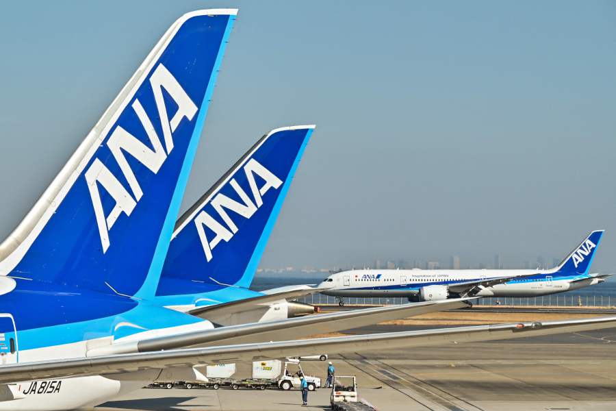 This photo taken on January 30, 2024 shows a passenger plane from Japan's All Nippon Airways (ANA) taxiing past others parked at the gates at Tokyo International Airport at Haneda in Tokyo. - AFP PIC
