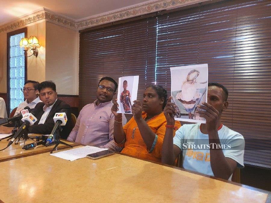 A.D. Mogahana Selvi (second, right) and her husband B. Suresh (right); with Malaysia-Singapore Workers Task Force chairman S. Dayalan and lawyer Dinesh Muthal (second, left) speaking to the media. The couple’s son is now left disabled after suffering a heatstroke. NSTP/NURUL HIDAYAH BAHAUDIN