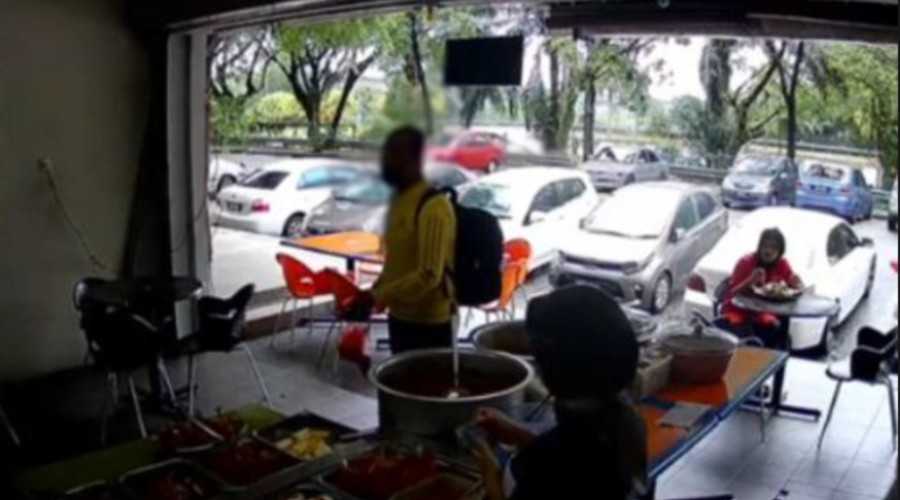 A video captured the moment a restaurant employee handed food and drink to the suspect, who became enraged when his request to be called ‘abang’ or ‘baby’ was ignored.- Pic credit social media