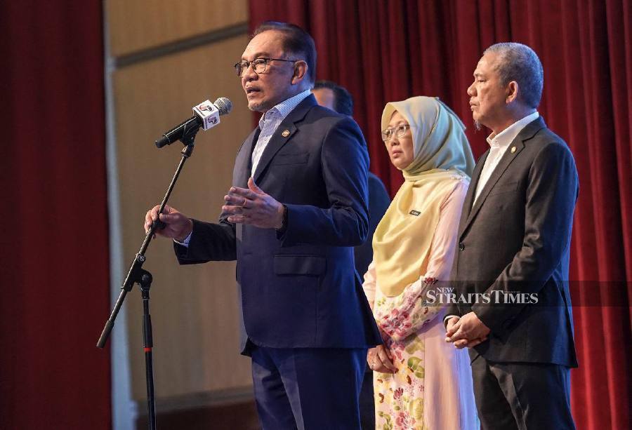 Prime Minister Datuk Seri Anwar Ibrahim delivers his speech during the Prime Minister’s Department monthly assembly in Putrajaya. -NSTP/MOHD FADLI HAMZAH