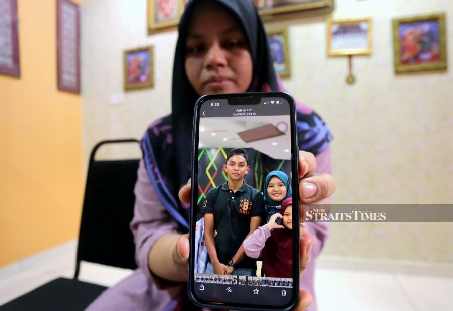 Nur Azza Assyaqiren said her brother, affectionately called Ami, was passionate about pursuing a career in the police force to make their parents proud. - BERNAMA PIC