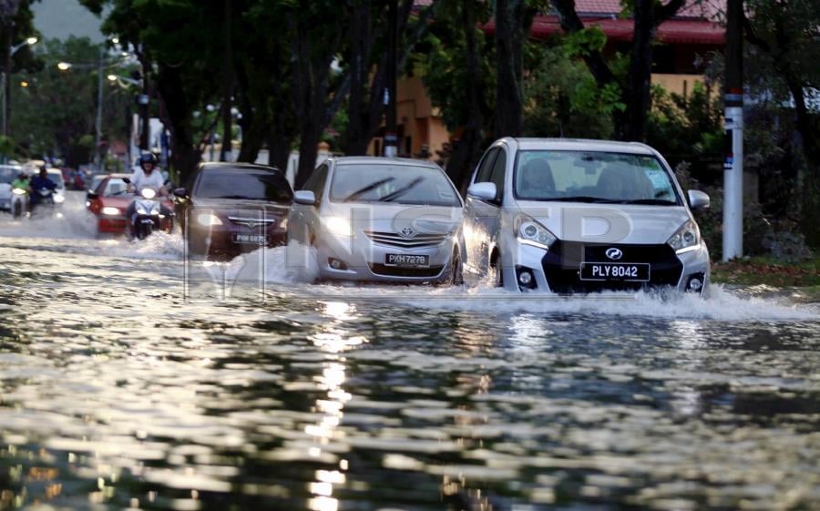 Continuous downpour triggers floods at low-lying areas in Penang | New ...