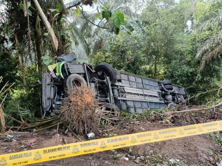 Police are awaiting the post-mortem report on the fatal tour bus accident at Km126 of Jalan Kuantan-Segamat near Muadzam Shah in Rompin, which claimed the lives of four people, including two teachers, on June 9. - Courtesy pic
