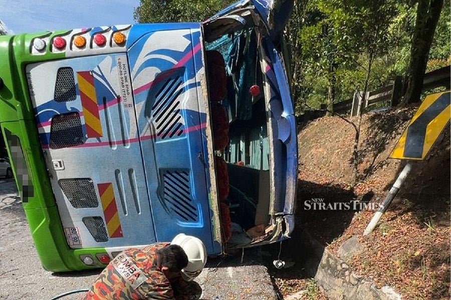 The driver of a tour bus that landed on its side at Km16.5 of Jalan Genting-Bentong near here on Saturday, will be charged at the Bentong magistrate’s court tomorrow. - NSTP filepic