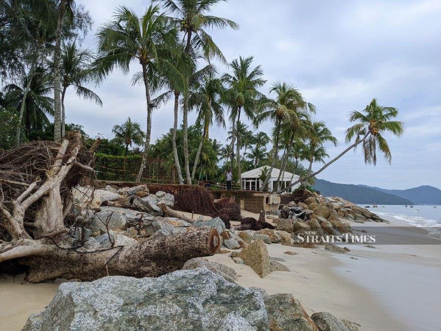 The Penang government acknowledged that erosion had worsened at the Golden Sands Resort public beach. - NSTP/ FOTO ZUHAINY ZULKIFFLI