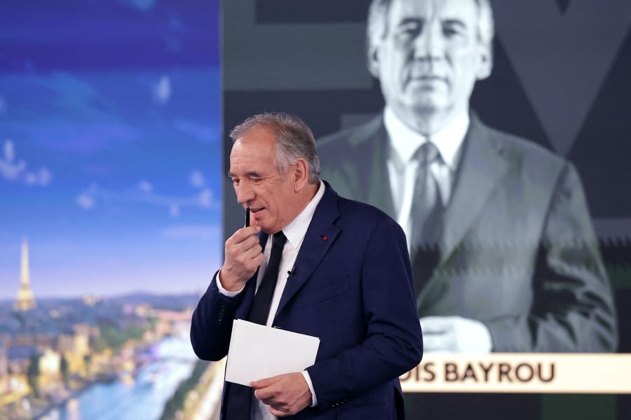 France’s Prime Minister Francois Bayrou gestures as he takes part in the political TV show “L’Evenement” (The Event) broadcast on French TV channel France 2, in Paris, on Thursday. - AFP PIC